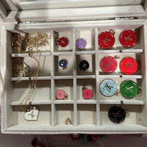 Louis Vuitton authentic pendants and wonderful condition.